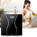 Black electronic bathroom scale with digital display for weight measurement up to 180 kg.