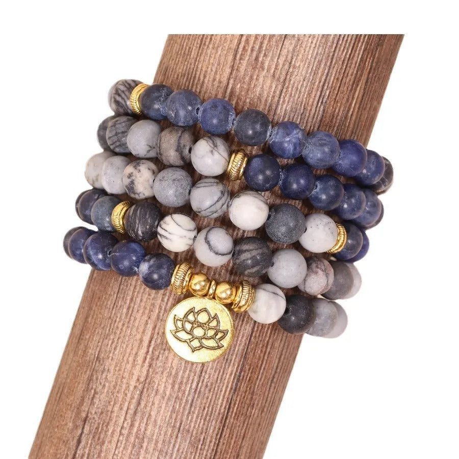Blue multi-layer bracelet with patterned network stone beads on wrist