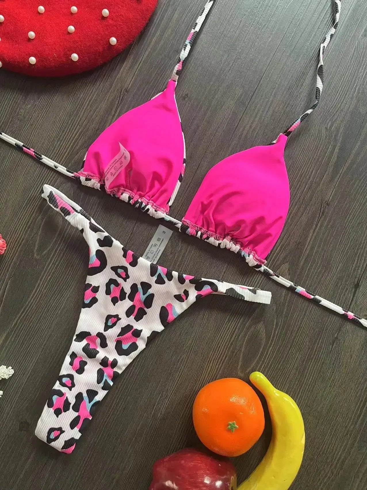 Women's printed nylon bikini with briefs style and cotton lining for swimming sports.