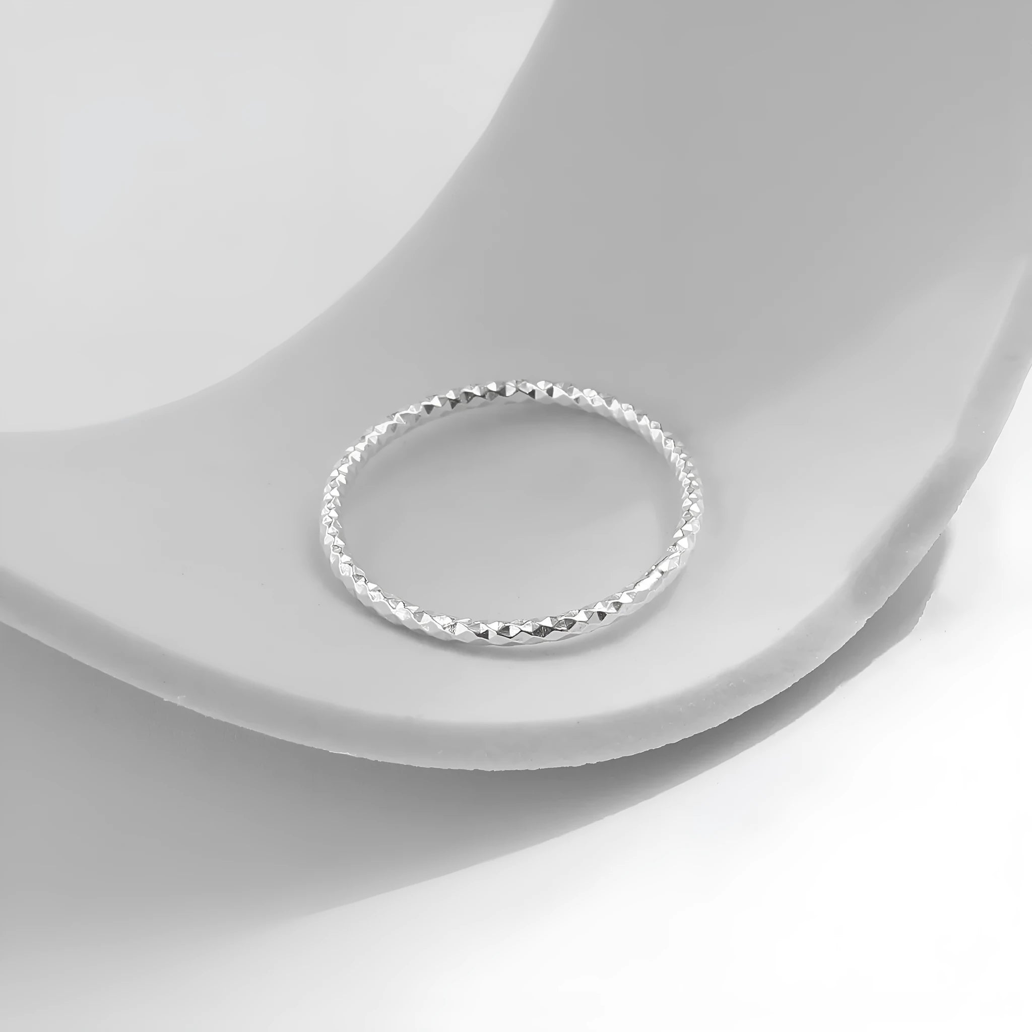 S925 sterling silver thin ring for women geometric style on white background