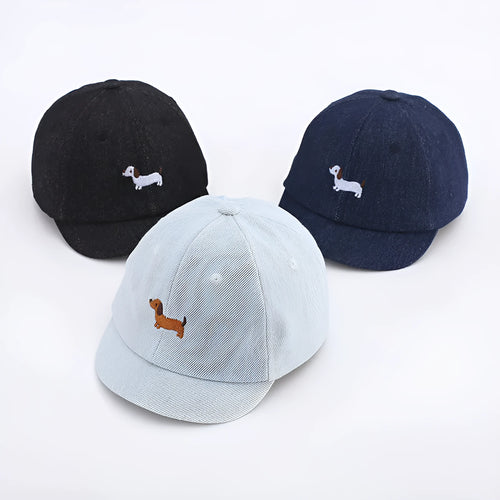 Denim puppy baseball cap for babies with 48cm head circumference in light blue