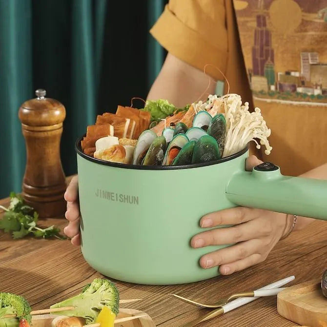 White, green, and khaki mini electric hot pot with non-stick interior and control panel.