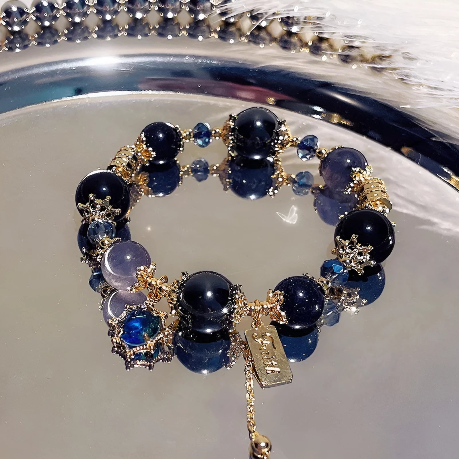 Women's galaxy colour bracelet with snowflake pendant, bow design, heart shape and cartoon character elements
