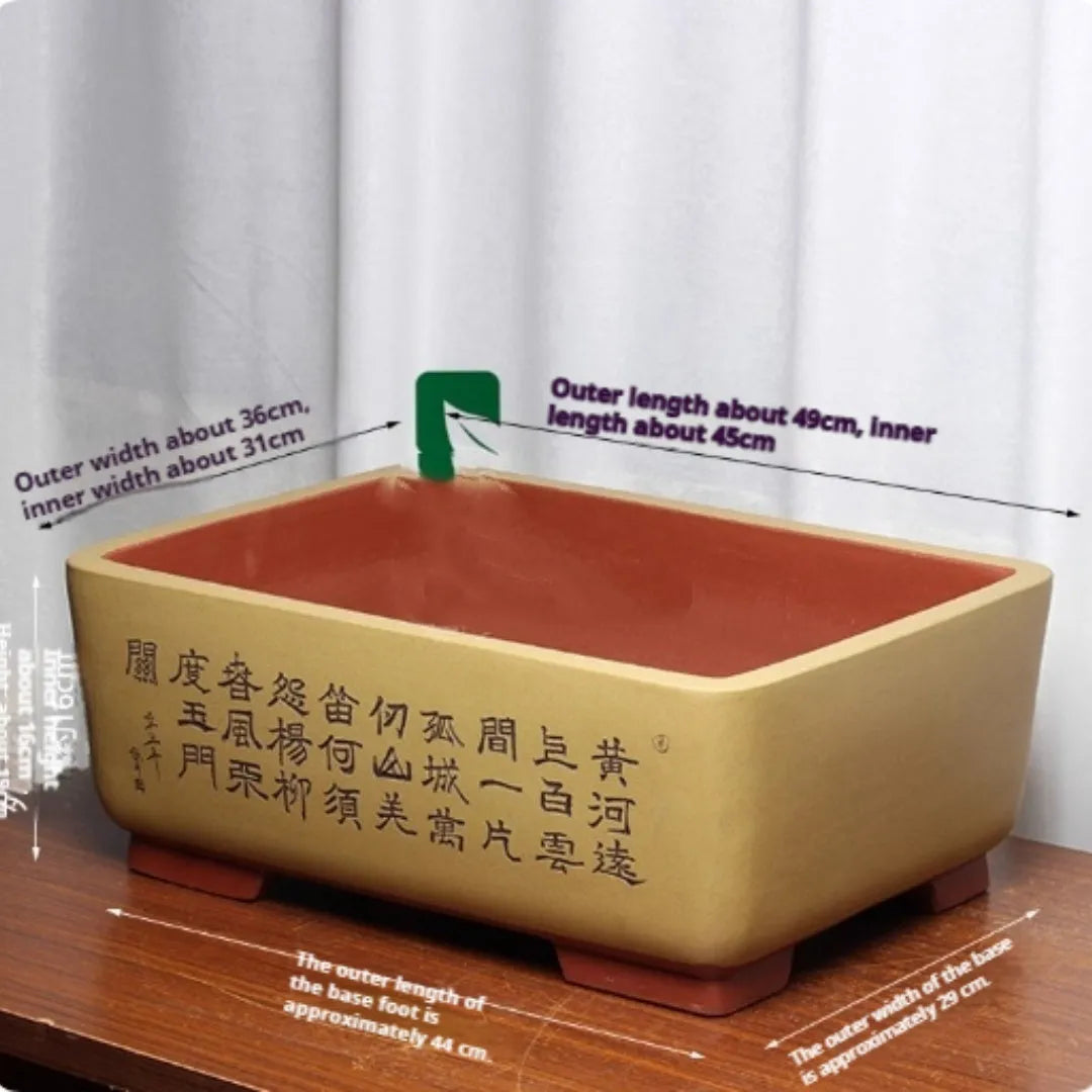 Purple clay Chinese style flower pot with plant on desktop, available in multiple colours and sizes