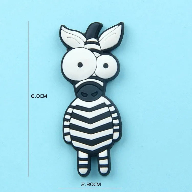 Set of 9 colourful PVC cartoon animal refrigerator stickers on a white fridge surface
