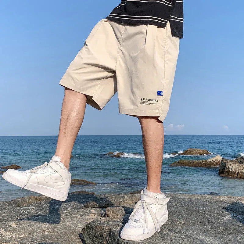 Men's ice silk quick-drying shorts in solid colour with straight tube cut and front tie closure