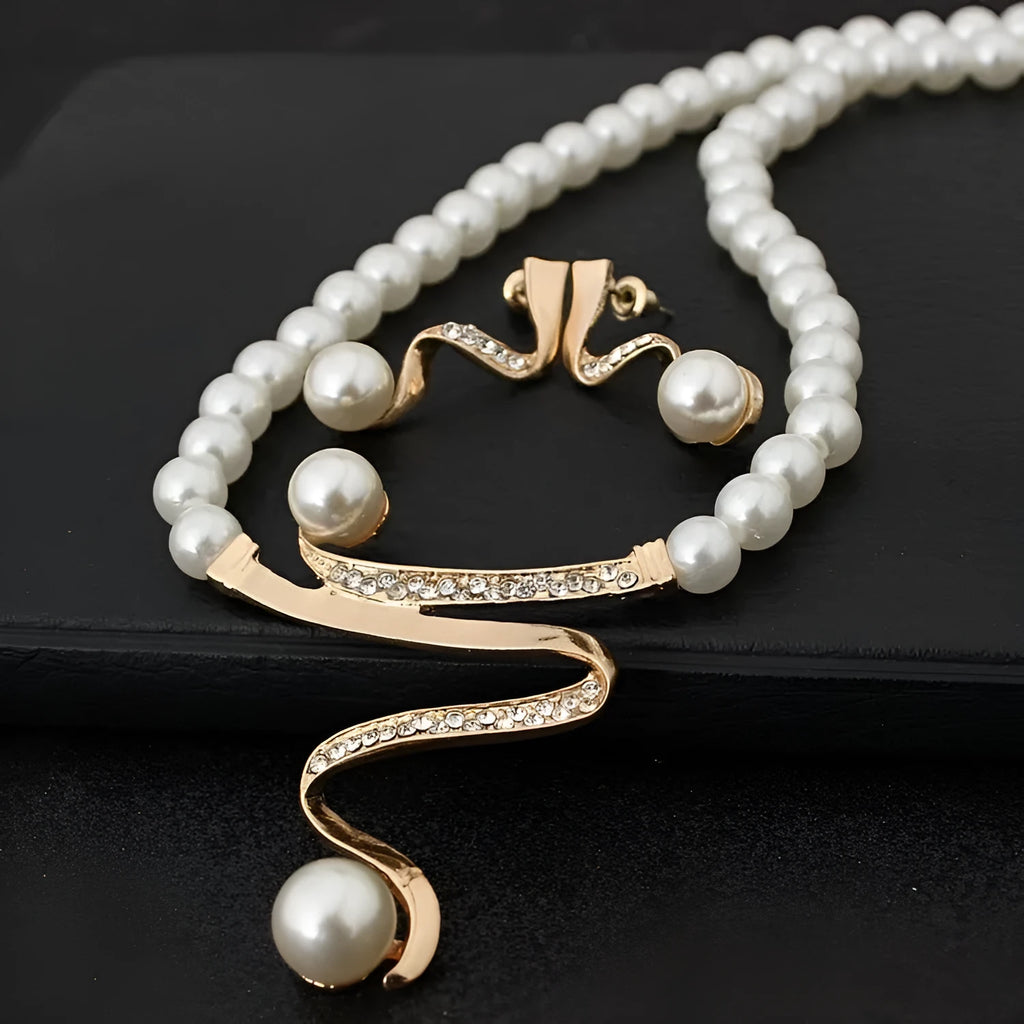 Gold pearl necklace and earrings set with drop-shaped pendant and electroplated finish