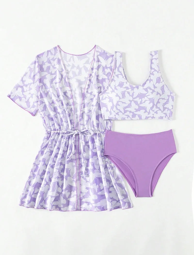Girls three piece polyester swimsuit set comprising a coat, vest, and pants in colour 3218