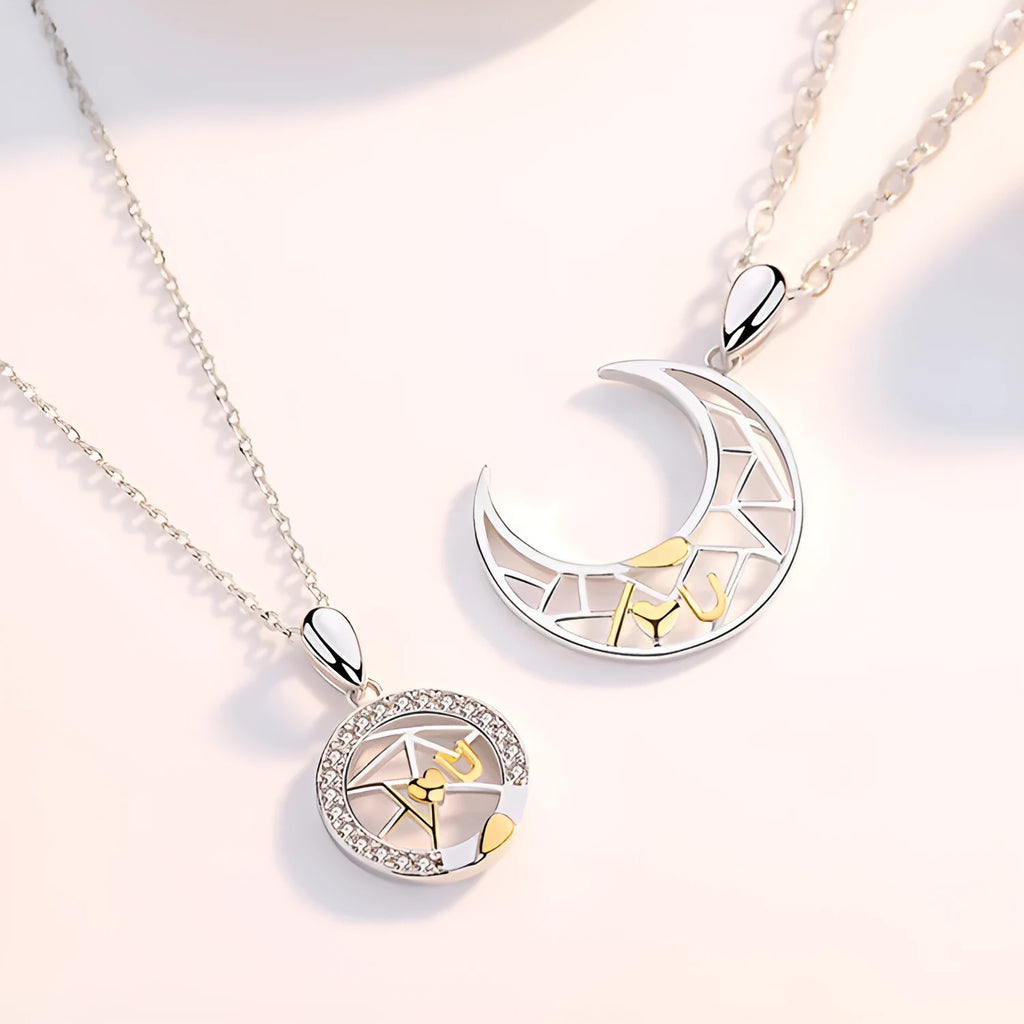 Sun moon tooth couple necklace with copper pendant on a cross chain, showing male and female colour variants.