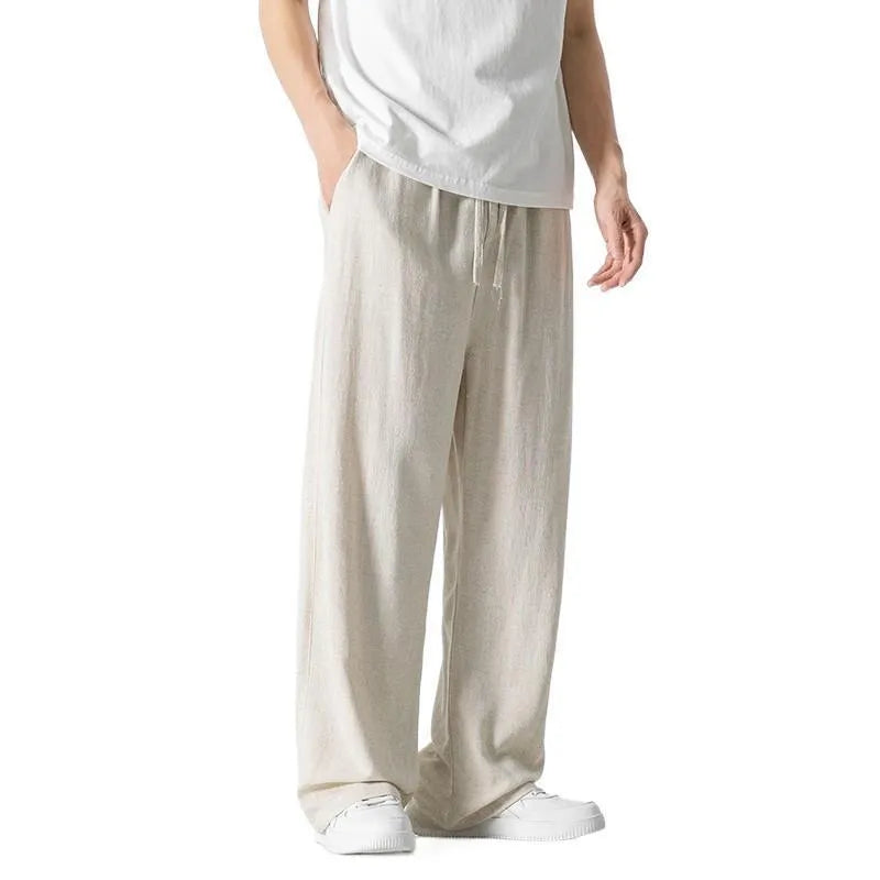 Men's straight-leg casual trousers in beige bamboo fibre fabric with a drawstring waist.