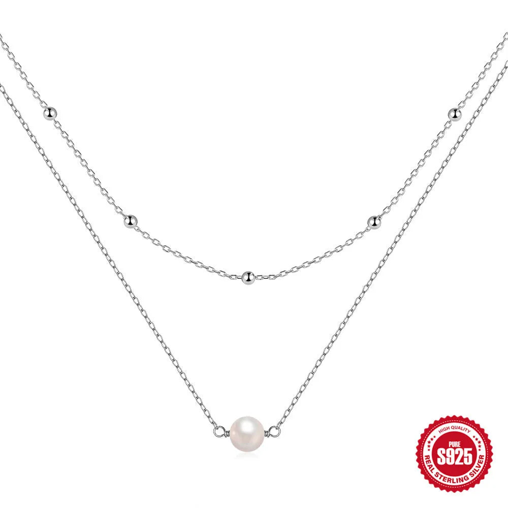 S925 sterling silver women's necklace with double-layer design and twin pearls in gold or white gold plating