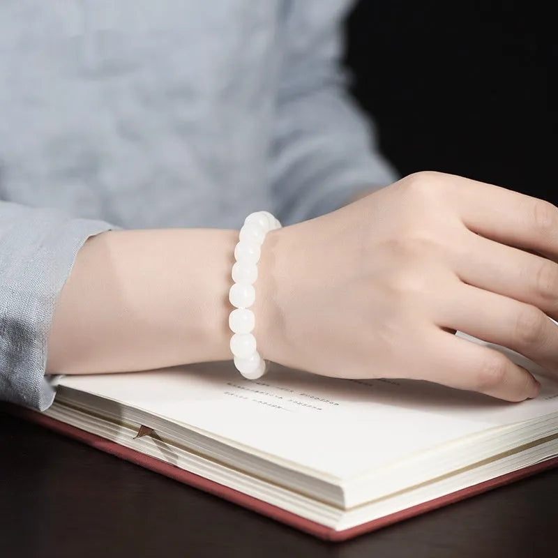 White jade barrel beads bracelet on wrist, Hetian jade, unisex casual style