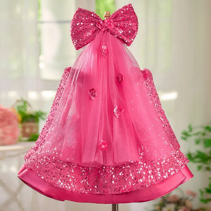 Girl's rose red sequined tulle tutu dress on child, polyester fabric, full skirt, side view
