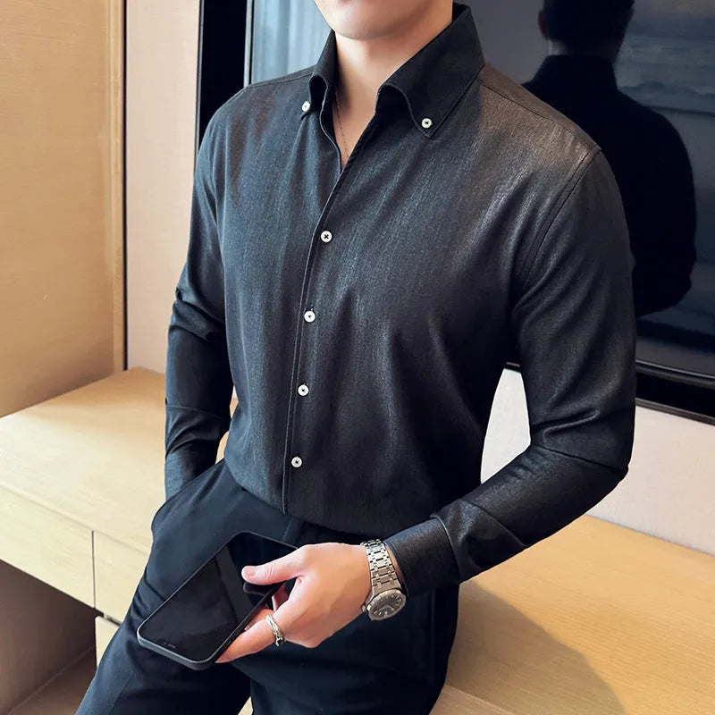 Men's slim fit long-sleeved denim shirt in black, shown in a cardigan style.