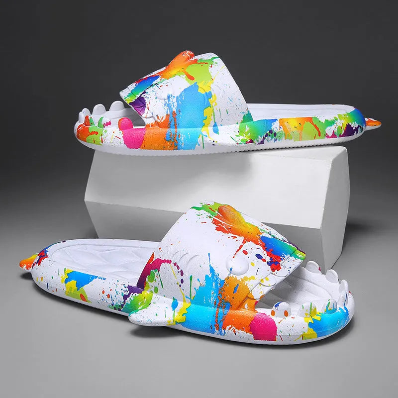 Casual open-toe shark design slippers in EVA material on a colour selection background.