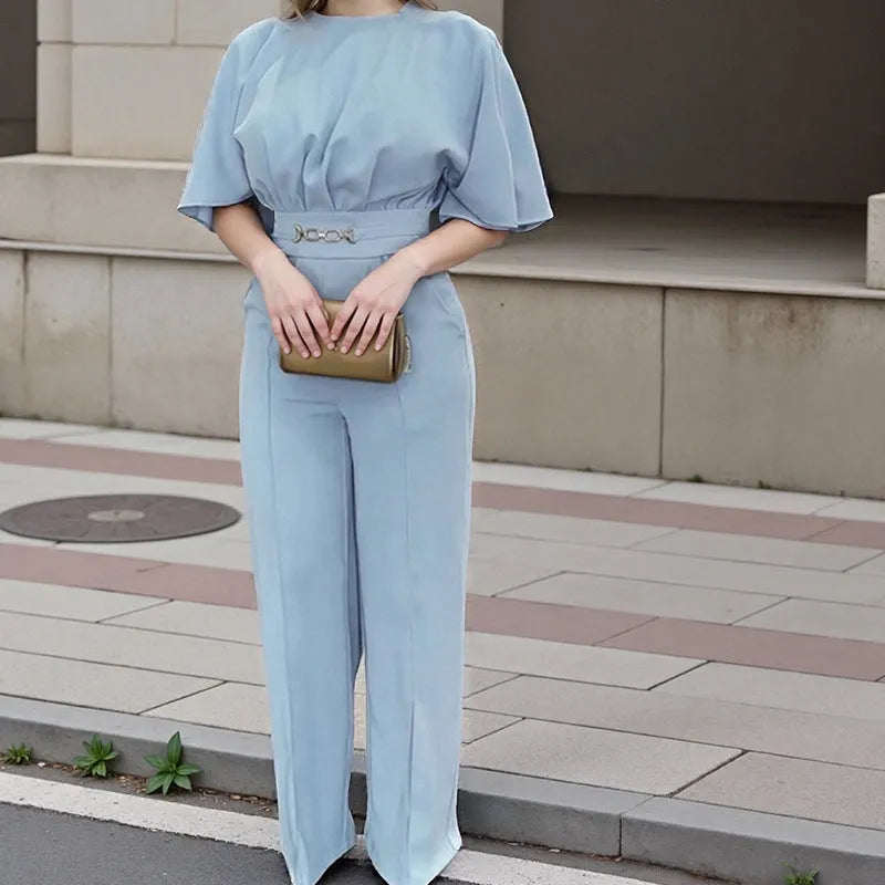 Blue men's two-piece polyester suit set with long-sleeved jacket and trousers on a hanger.