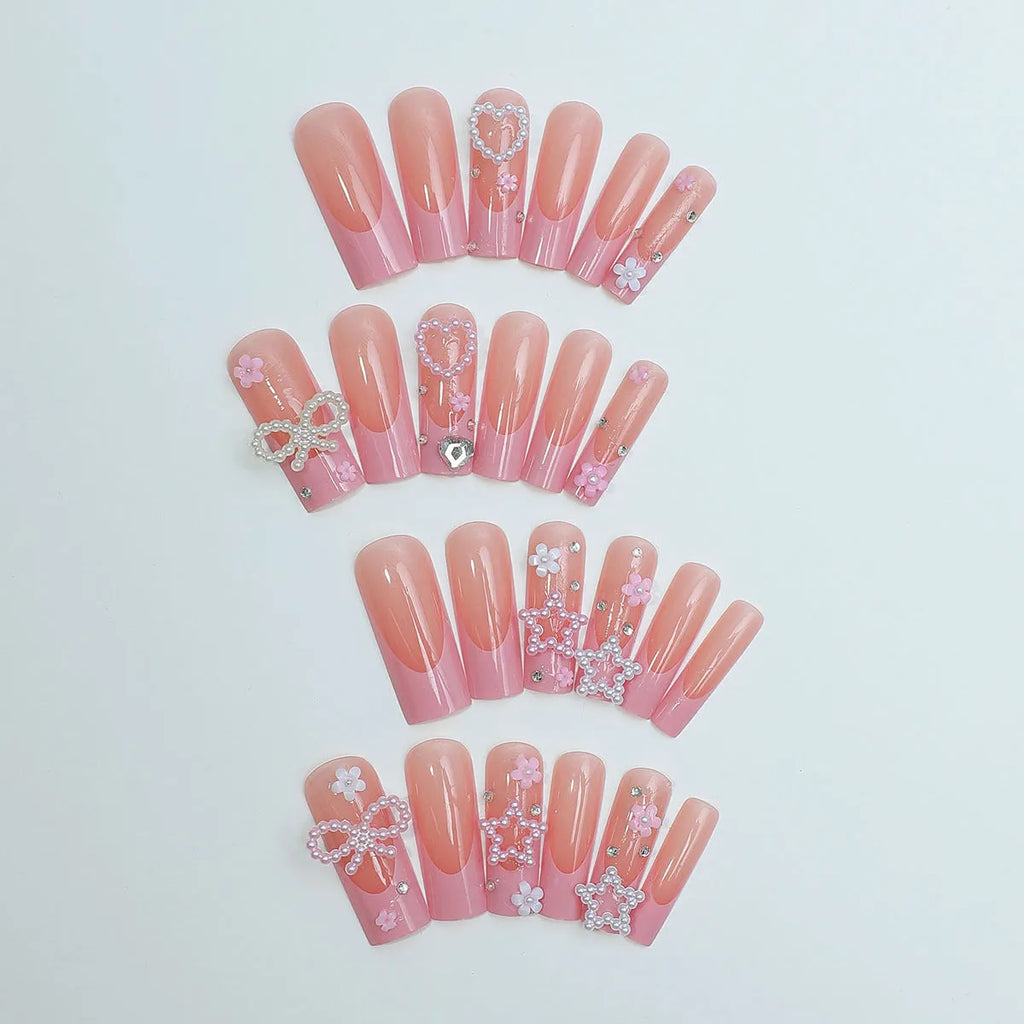 Super long water pipe shaped artificial nails with French spot drill and a bow detail in colour XB-70-48.