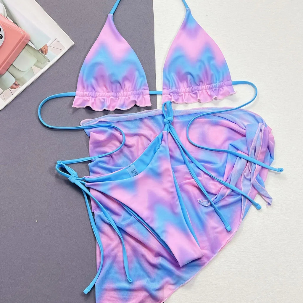 Women's tie-dye bikini swimsuit set with matching high-waisted skirt