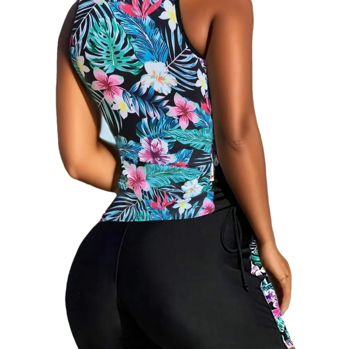Plus size women's floral print bikini swimsuit with high waist briefs on a mannequin.