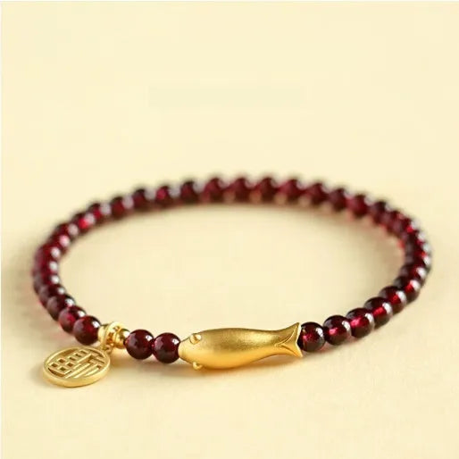 Chinese style gourd bracelet with imitation garnet stones and cultural motifs including Fu character design