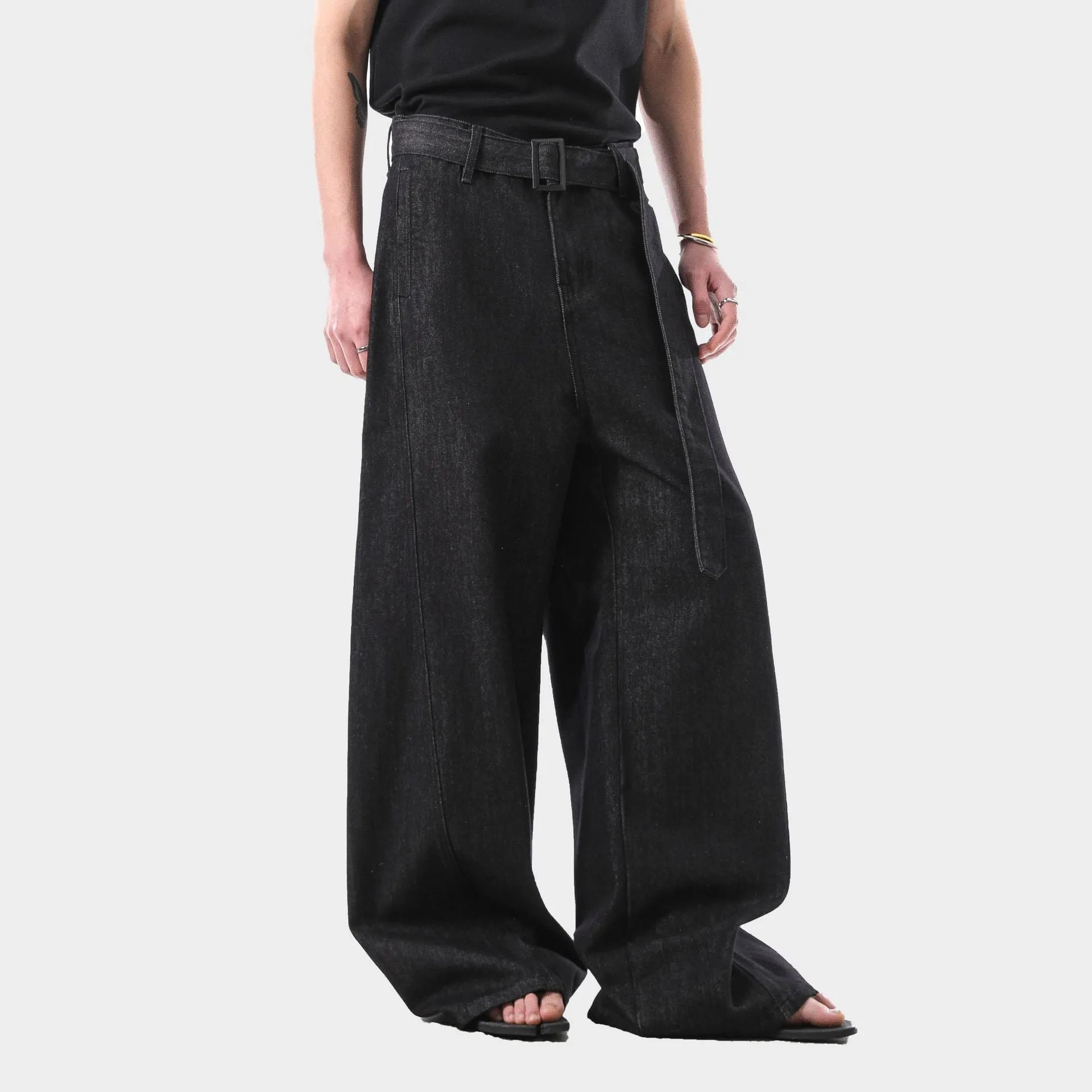Black high waist straight leg jeans with a zip fly, shown flat.