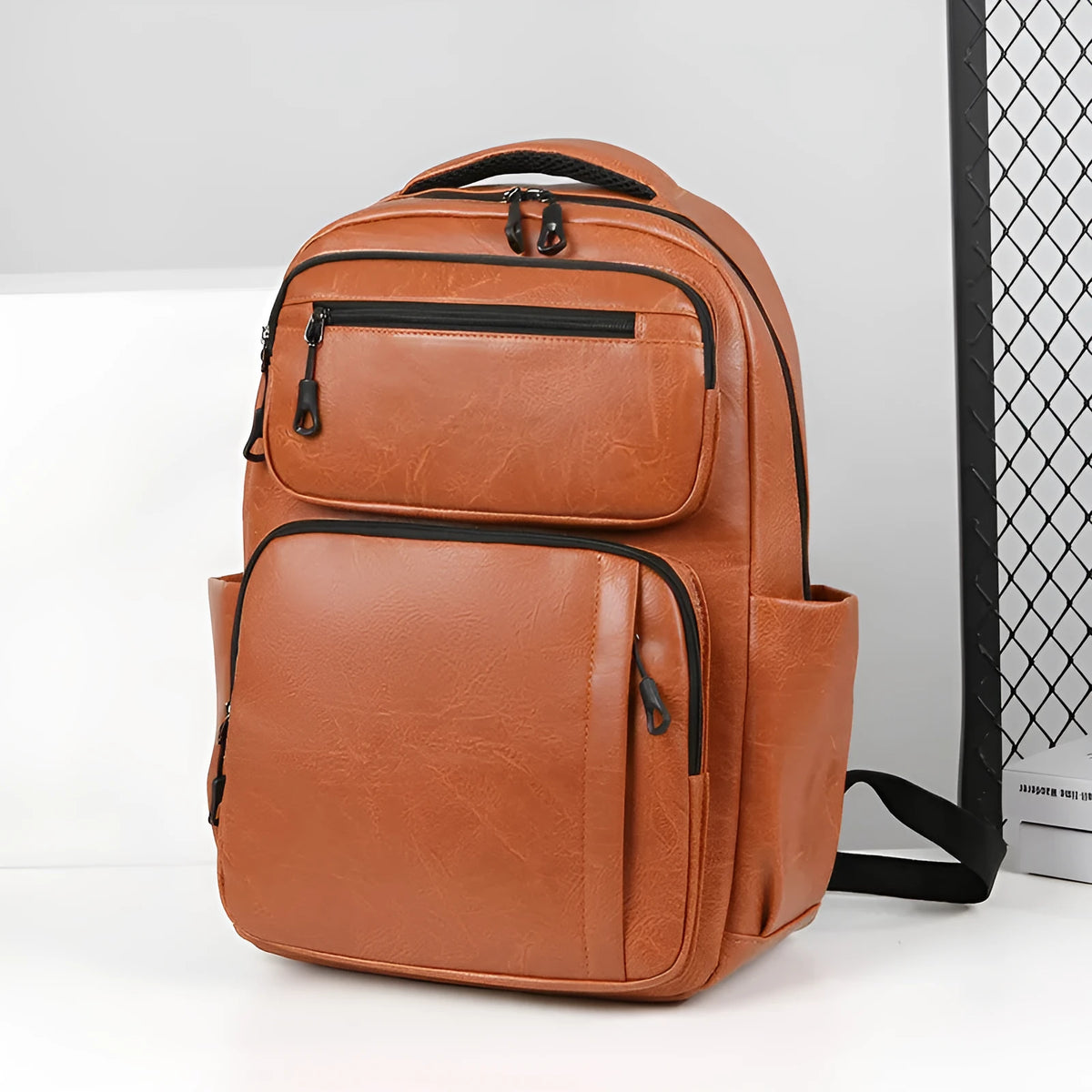 Large capacity men's business commute backpack in black, PU material, multi-space design, curved shoulder strap