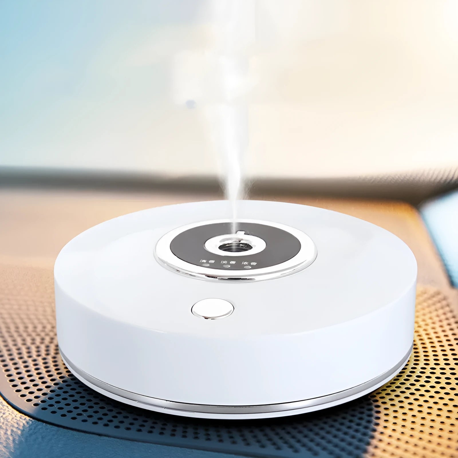 White, grey, and black USB car aromatherapy diffuser with anti-slip pad for dashboard mounting.
