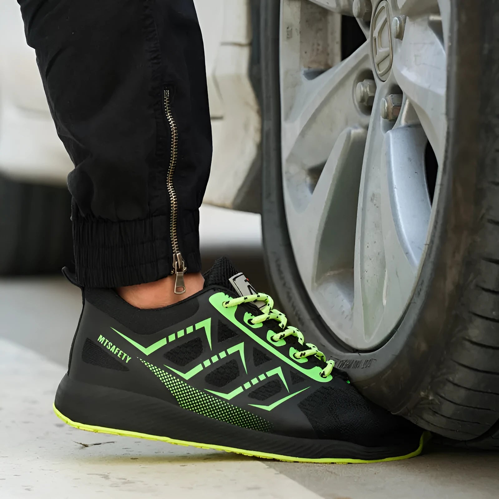 Black ultra-light labour protection shoes with steel toe caps and lace-up front closure
