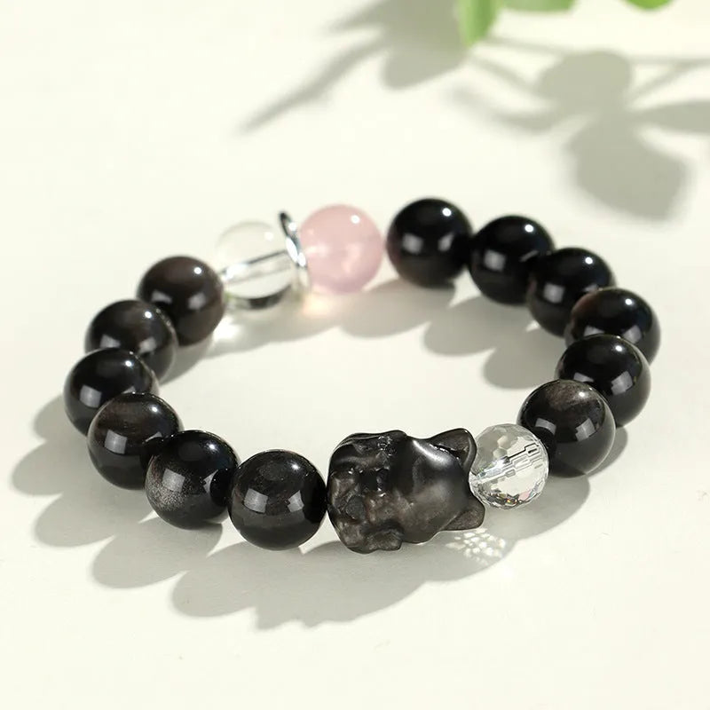 Silver stone crystal bracelet with fox charm featuring white, pink and navy blue beads