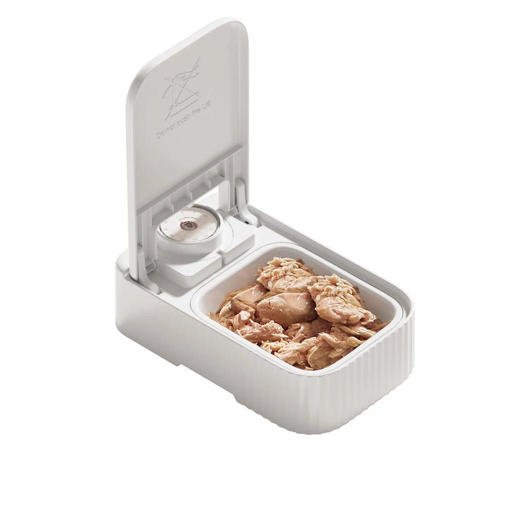 White timed pet feeder with visual alarm display and separate ice crystal box for freshness.