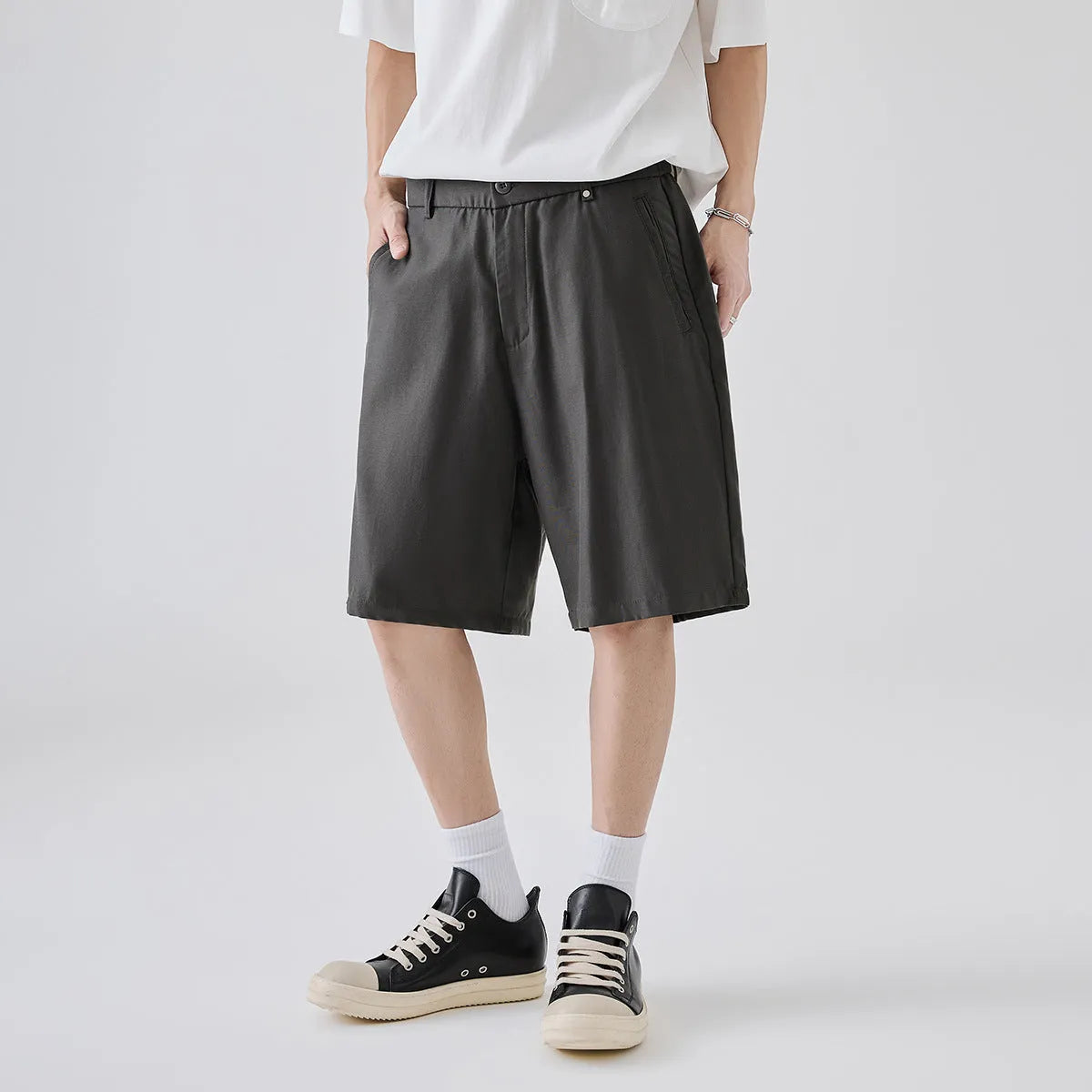 Men's lyocell casual shorts in apricot colour with loose fit design and elastic waistband