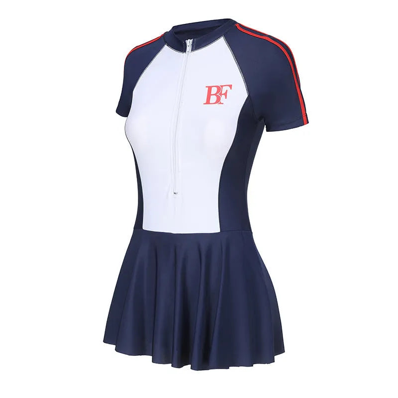 Ladies conservative sports one-piece swimsuit in a colour-matching pattern, shown on a model.