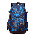 Blue and red classic nylon backpack showing front view and multiple compartments