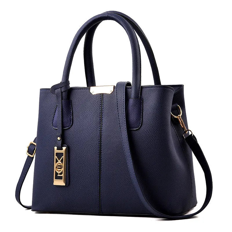 Women's large capacity shoulder bag in soft PU leather with adjustable strap and multiple colour options