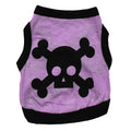 Dog wearing blue Halloween vest with skull bones pattern, stretch cotton pet costume