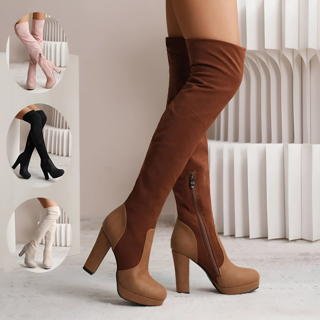 Black suede over-the-knee boots with a high square heel and round toe