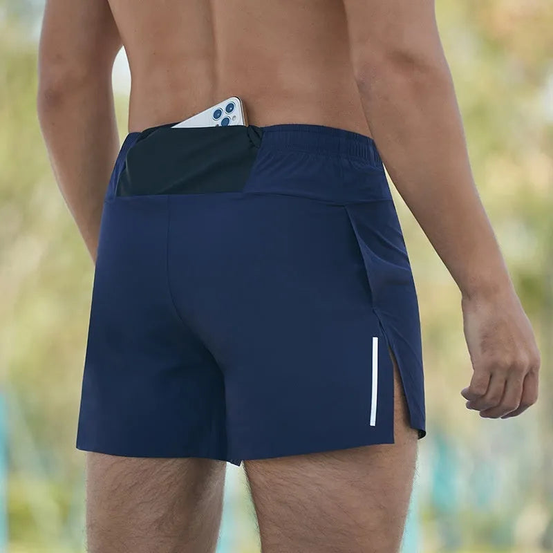 Men's red off-road running shorts with a high waist and loose fit, shown for marathon and cross-country running.
