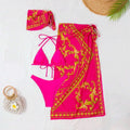 Women's vintage print lace-up bikini swimsuit three-piece set in blue on a mannequin.