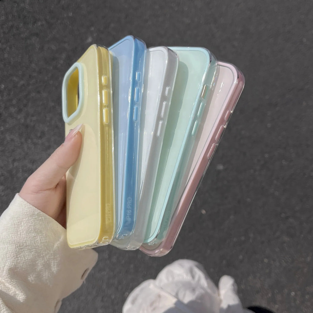 Simple solid colour jelly TPU phone case for iPhone, shown in blue, white, and yellow.