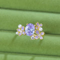 Women's floral open ring with zirconia stones in yellow or light purple electroplated metal