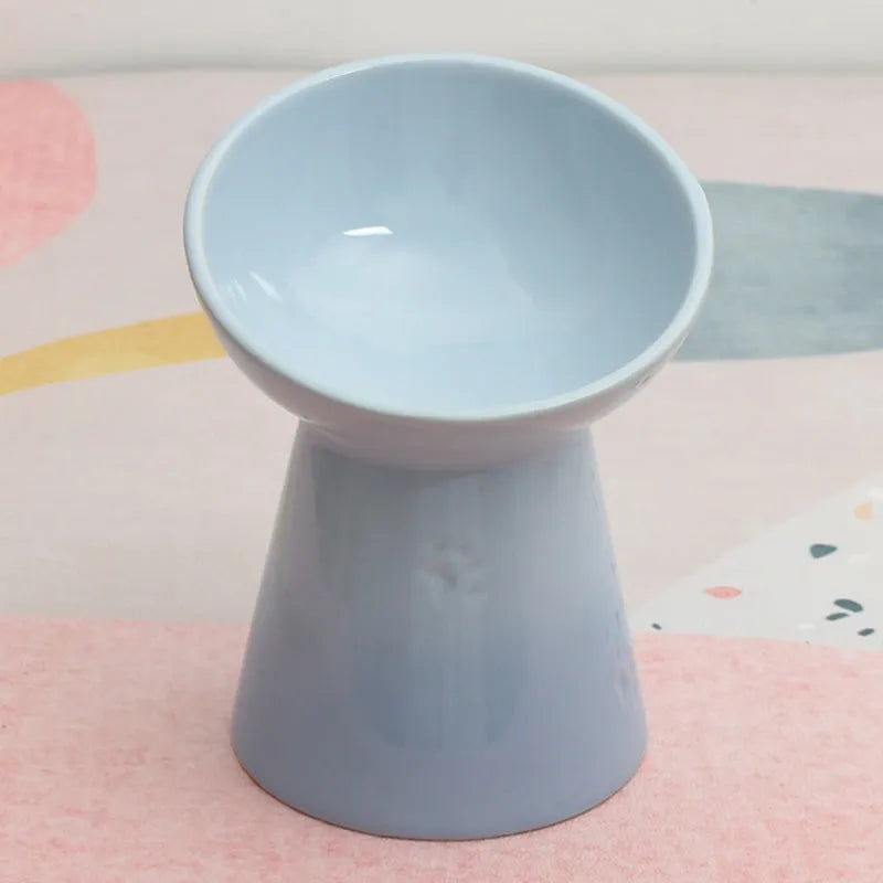 Black ceramic pet bowl with a high foot and neck protector to prevent tipping, shown with flat and slanted rim options.