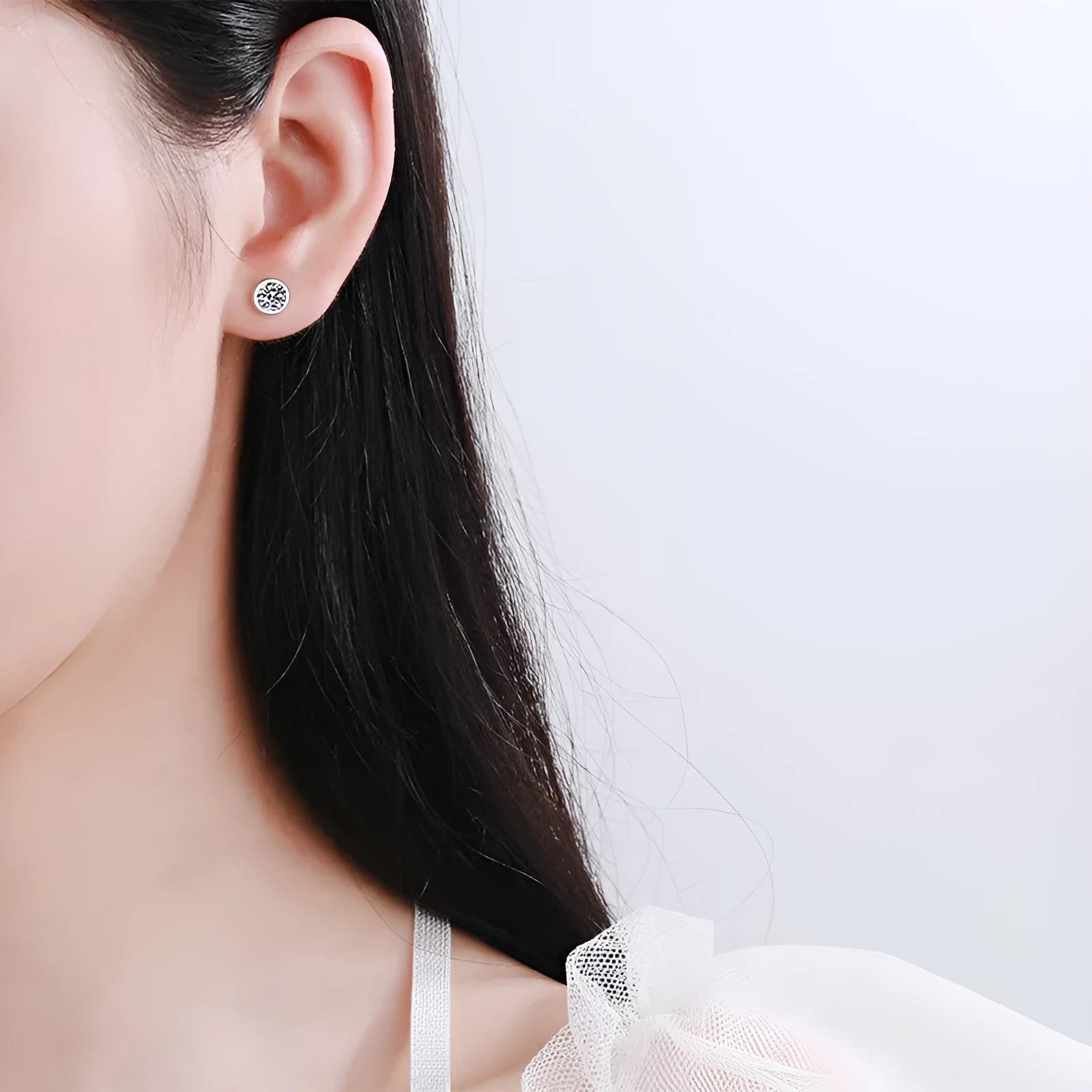 Geometric gold-plated sterling silver women's earrings with a moissanite or zircon centre stone.