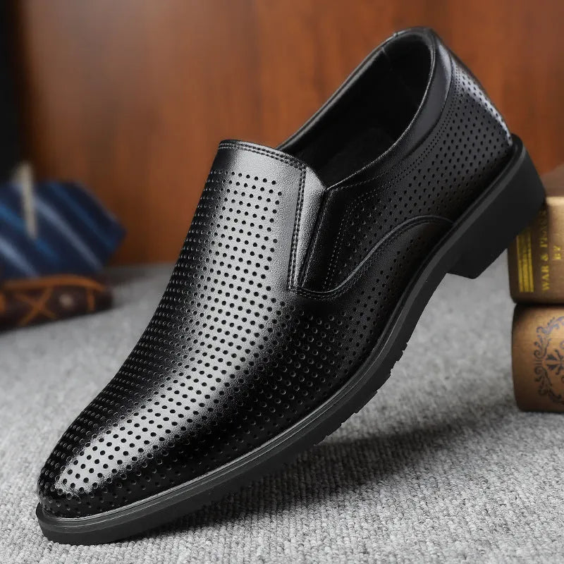 Men's black leather slip-on loafers with a rubber sole and leather toe cap on a white background.