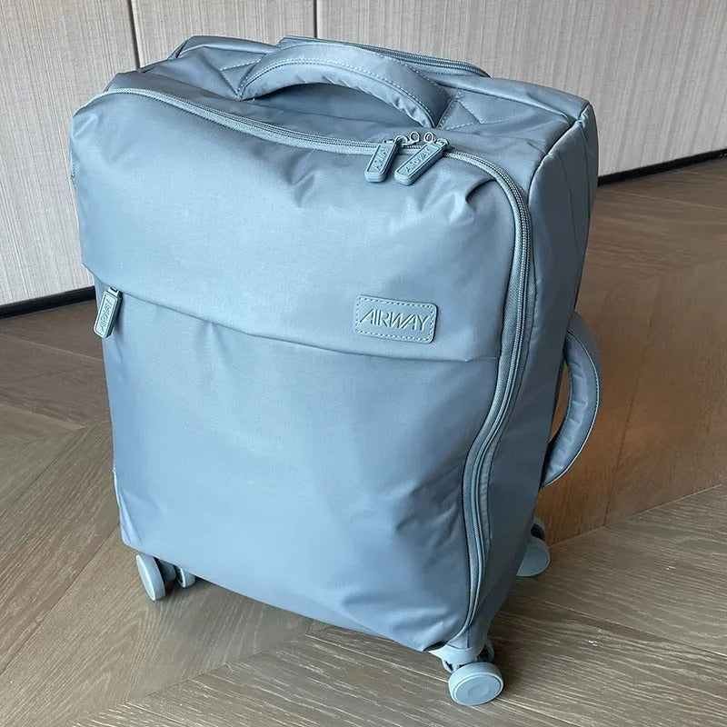 20-inch waterproof Oxford cloth luggage suitcase with universal wheels in bluestone green colour