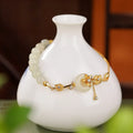 925 silver lotus peace buckle bracelet with Hetian jade inlay on wrist