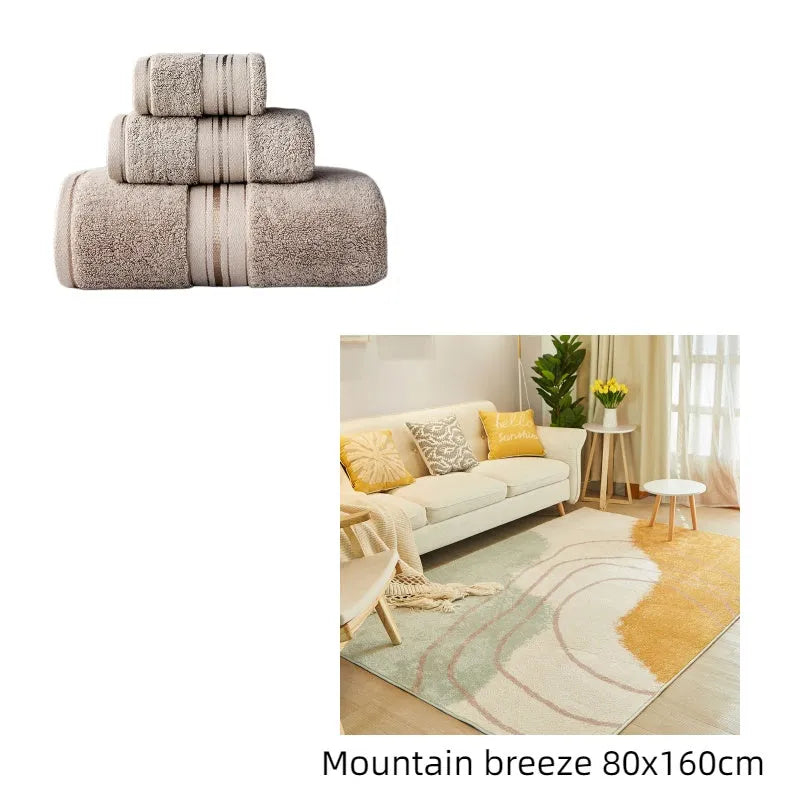 Three-piece cotton bath towel set in floral colours showing bath towel, hand towel and face cloth with optional logo printing