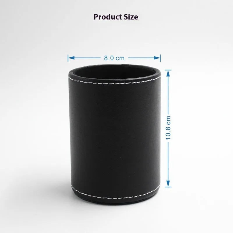 Black leather round pen container on desk with dimensions 8.0cm diameter 10.8cm height