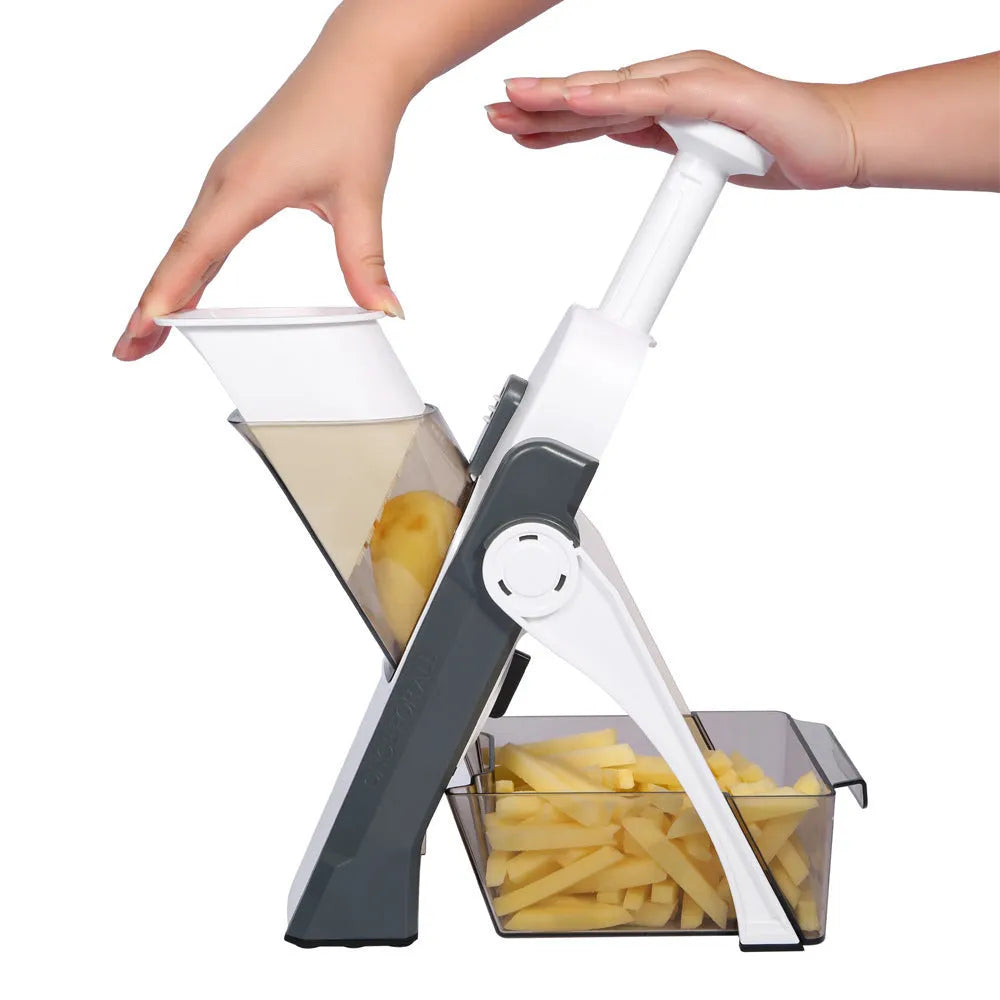 Multifunctional vegetable cutter in orange with adjustable slicing thickness and fold-down design, 32x12x6.3cm
