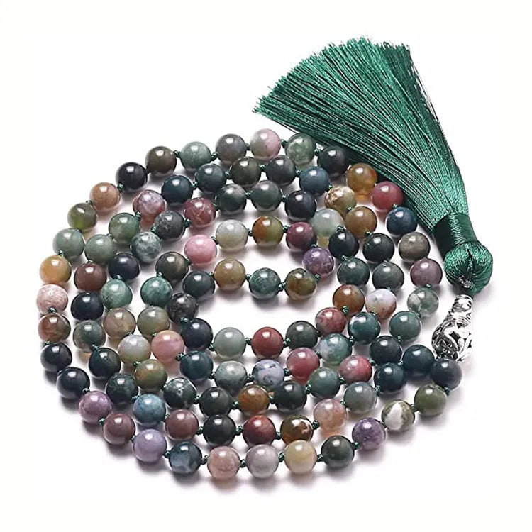 Agate amethyst blue pattern tassel necklace with geometric pendant on neutral background