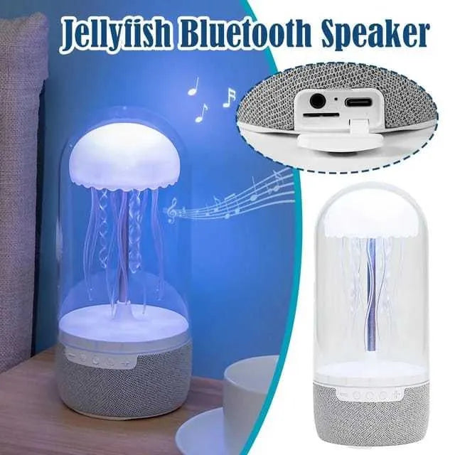 White compact 3-in-1 Bluetooth speaker jellyfish lamp with LED colour lights on a desk
